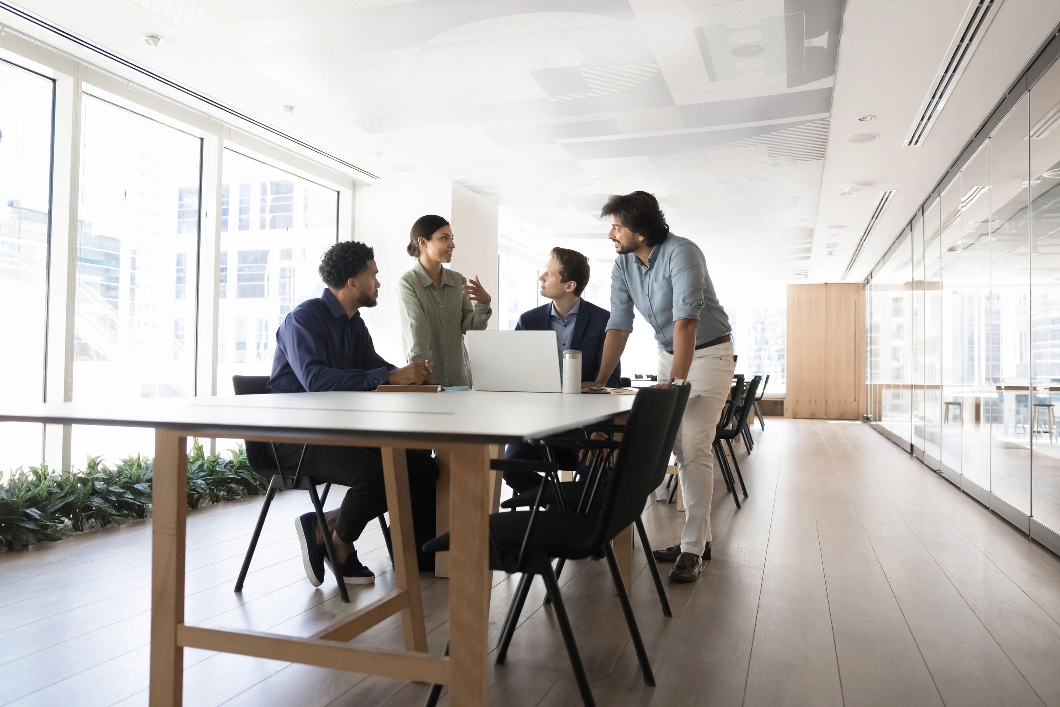 EVO AIQ team collaborating in a modern office