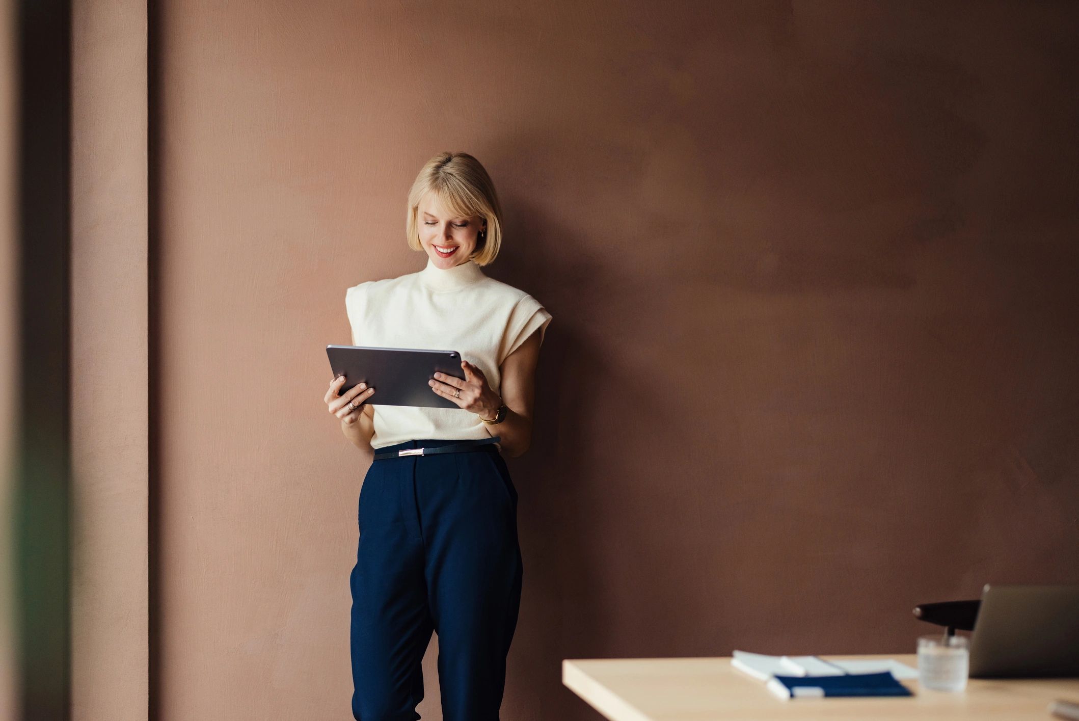 Property management professional using technology in a modern office